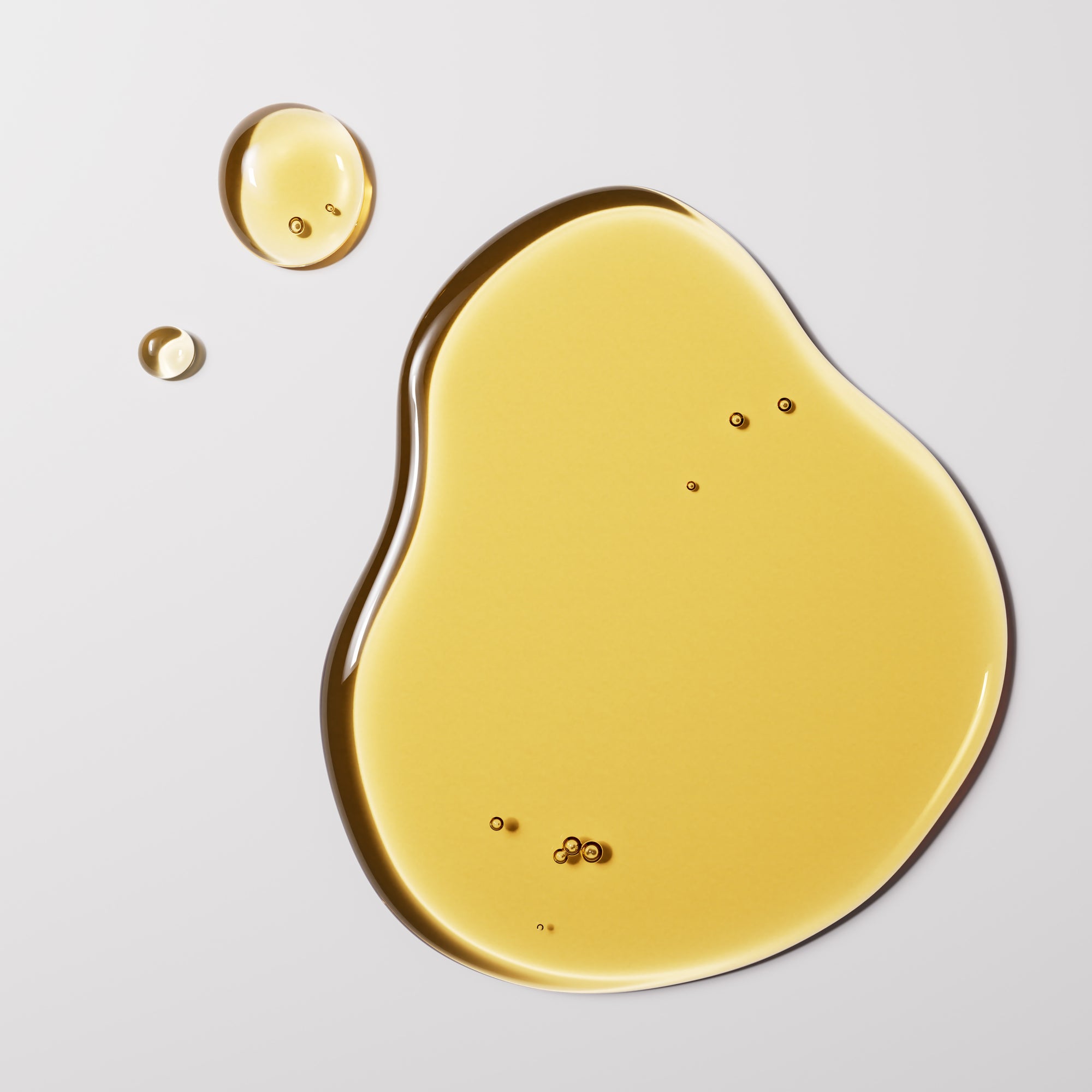 A pool of yellow, warm toned oil in Noén Nile Oil